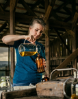Jaime pouring the First Press in the barn