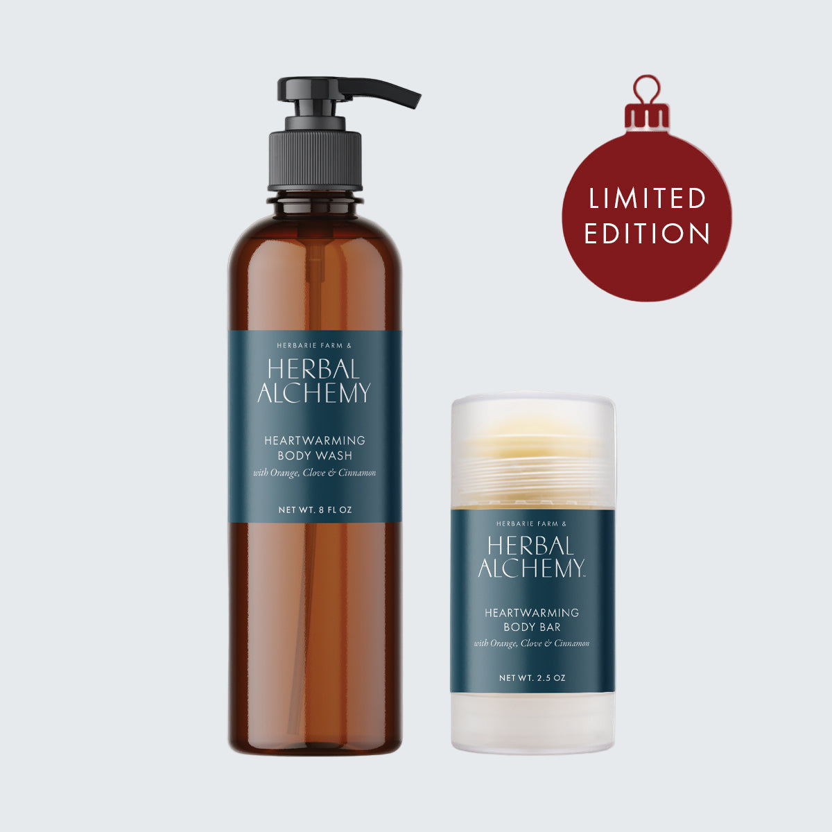 A Herbal Alchemy skincare set with a body wash and body bar, featuring wild orange, clove, and cinnamon. The packaging is primarily brown and white with text and a pump.